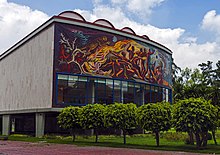 The Conquest of Energy by Jose Chavez Morado in UNAM, Mexico City. Mural on rear of Alfonso Caro Auditorium, UNAM, Mexcio City.jpg