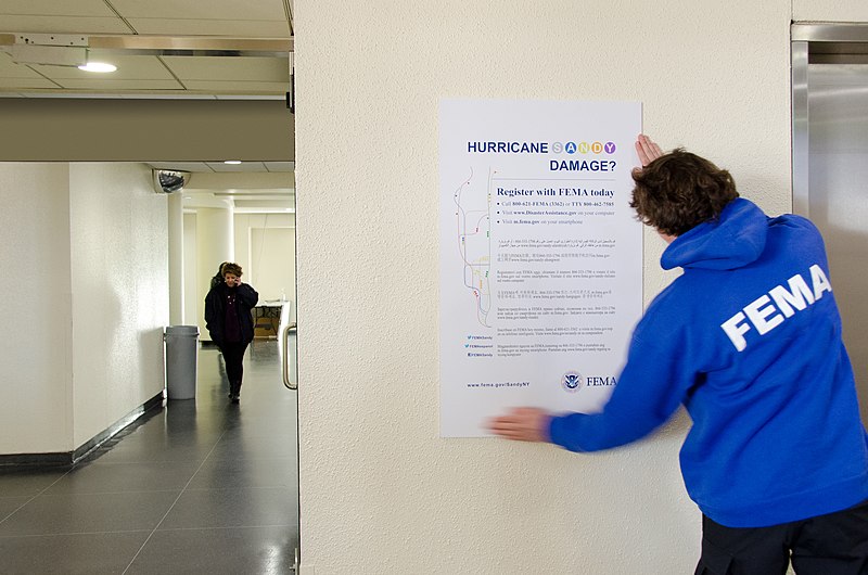 File:N.Y., Jan. 23, 2013 -- A disaster assistance poster is placed inside this Disaster Recovery Center for Hurricane Sandy survivors - DPLA - 665bc347bd271322a47497912642e383.jpg