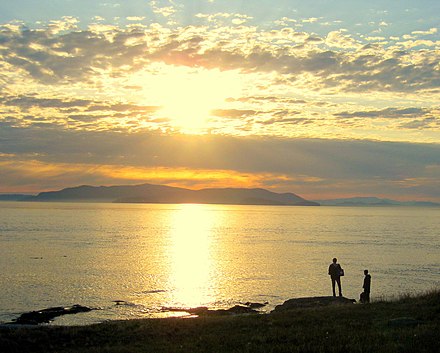 Visitors admiring the sunset from Patos Island