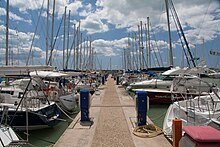 A pier in the port Porto Turistico Di Roma (150969995).jpeg