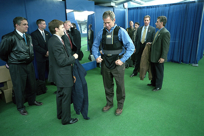 File:President George W. Bush puts on a protective vest.jpg