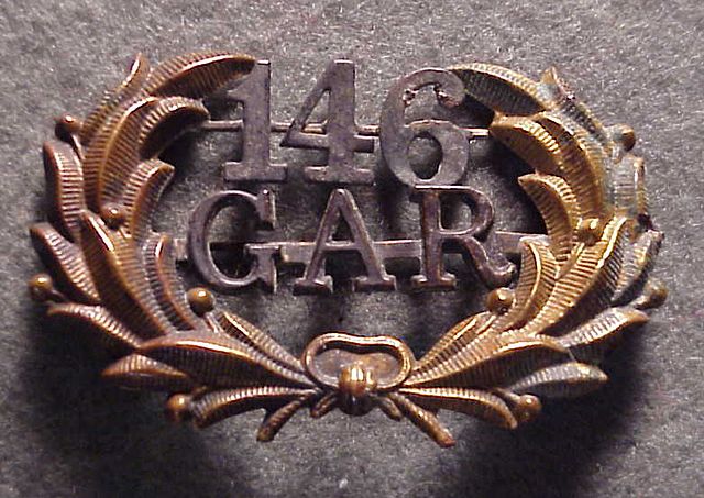 Grand Army of the Republic uniform hat badge from Post No. 146, "RG Shaw Post", established by surviving members of the 54th Massachusetts in 1871