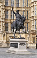 Marochetti's bronze equestrian statue of Richard Coeur de Lion stands outside the Palace of Westminster in London.