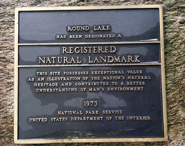 Plaque recording the status of Round Lake as a National Natural Landmark
