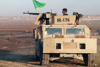 SDF fighter in Al-Baghuz Fawqani