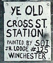 Hand-painted signage in 1977 Sign at Cross Street station, 1977.jpg