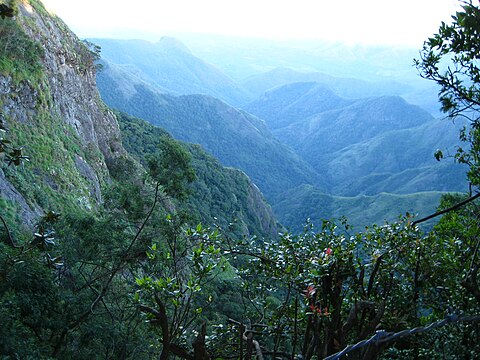 This is the Green Valley View (formerly "Suicide Point") at Tamil Nadu, India, now officially closed, though only protected by a few bamboo sticks criss crossed, and still very much a nice place.