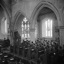 Thanksgiving Day service for members of the United States Army Air Corps, held in a church in Cransley, Northamptonshire, England, November 23, 1944 Thanksgiving Day Service Held in English Country Church- Americans in Cransley, Northamptonshire, England, UK, 23 November 1944 D22929.jpg