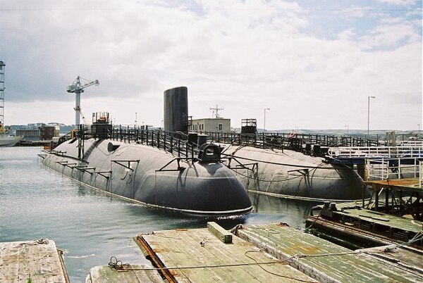 HMS Warspite (left) and HMS Conqueror (centre) with HMS Valiant (at rear) at HMNB Devonport Navy Days, 26 August 2006.