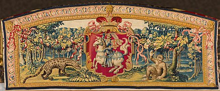 Above-door tapestry with the arms of Lithuania flanked by a hyena and a monkey