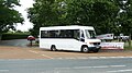 English: Wightbus 5867 (KX08 OMT), a Mercedes-Benz bus, leaving Medina High School, Newport, Isle of Wight onto Fairlee Road, on a school bus route, despite the fact the only visible destination details shows "Dial-a-Ride".