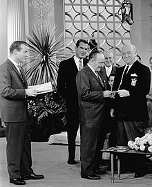 William Frawley receives a lifetime baseball pass from the Angels' Fred Haney in January 1961. Fred MacMurray also was part of the Frawley show. William Frawley This Is Your Life 1961.JPG