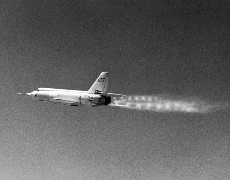 The X-2's twin set of shock diamonds in the exhaust plume, characteristic of supersonic conditions from a two-chamber rocket engine.