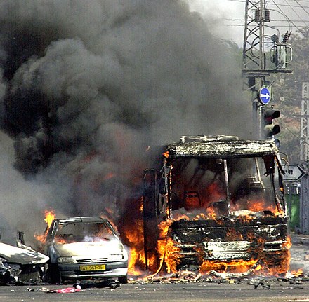 Wreckage vehicles after a 2001 suicide bombing in Beit Lid Junction