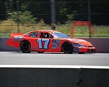 David Mayhew in the 17 car at Portland International Raceway in 2011. 17 MMI Super Stock car (5980815957).jpg