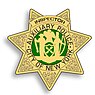 Escudo de inspector auxiliar