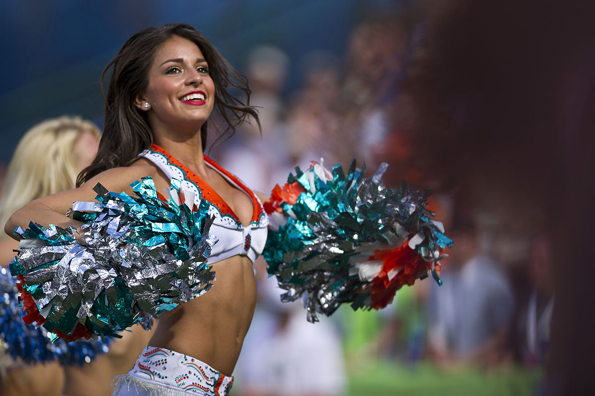 File:A Miami Dolphins cheerleader performs at Aloha Stadium during the 2012...