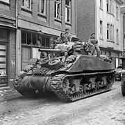 A Sherman tank of 8th Armoured Brigade in Kevelaer, Germany, 4 March 1945