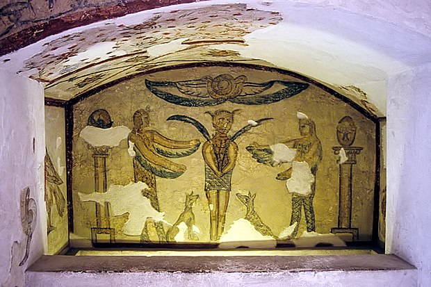 Painting from the Tigrane tomb in the Catacombs of Kom El Shoqafa, showing a man carrying palm branches who may be an initiate of Isis[78]