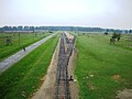 View from tower looking down onto railway leading in to Auschwitz II