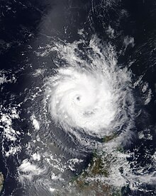 Satellite image of Belna showing a ragged eye and well-defined rainbands