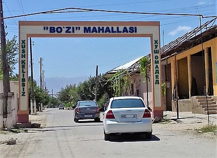 Greeting in two languages: Uzbek (Latin) and Tajik (Cyrillic) at the entrance to one of the mahallahs (Bo'zi)  of Samarkand