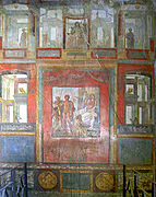 Fresco de la Casa de los Vettii, antes del 79 d. C. Los distintos estilos pompeyanos utilizan entre, otros recursos, el color para conseguir efectos de ilusionismo arquitectónico.