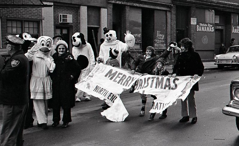 File:Characters in costume and others march in North End Christmas Parade (23725565816).jpg