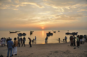 Fishing boats in Chavakkad Beach after a catch.