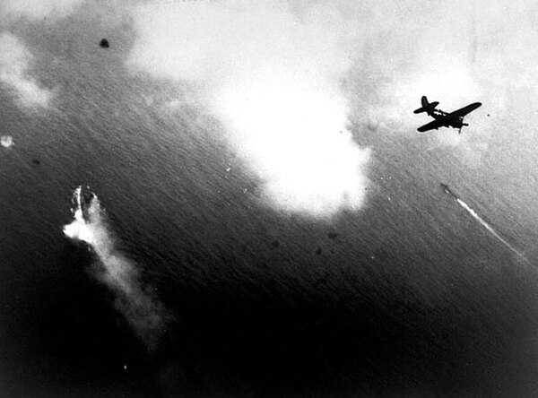 Aircraft such as this SB2C Helldiver begin their attacks on Yamato