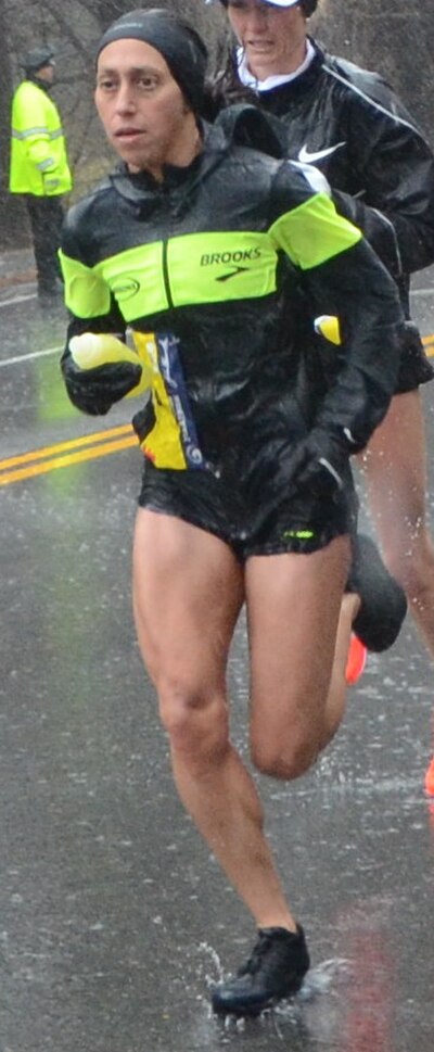 Des Linden near halfway point of Boston Marathon 2018 in which she placed 1st.