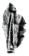 Black and white photograph of a helmet fragment from the East Mound at Gamla Uppsala