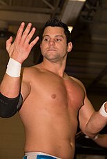 Inaugural champion Eddie Edwards Eddie Edwards at Smash 2015.jpg