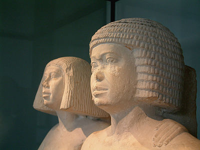 Egyptian couple wearing formal wigs of the 4th or 5th dynasties