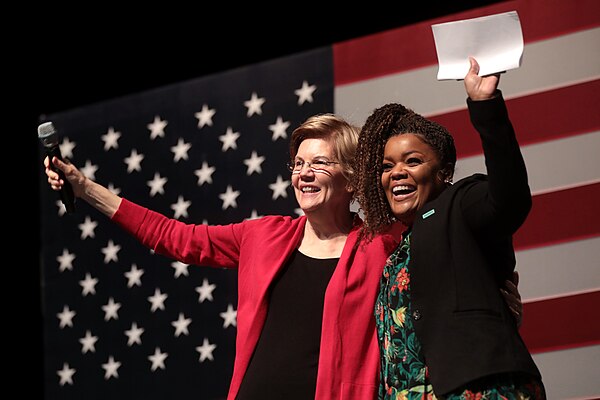 Brown (right) campaigning with Elizabeth Warren