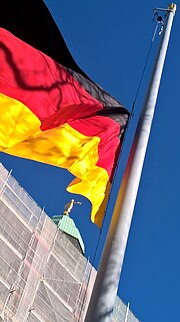 Thumbnail for File:Flags at half staff in front of the New Town Hall in Dresden - Image impressions of a Street Photographer on 11 March 2022 in Dresden - Image 008.jpg