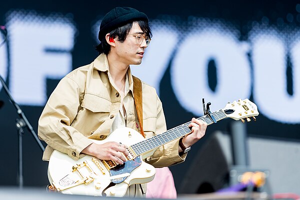 Founding mainstay Jung Kim on guitar, Rock am Ring, Nürburgring racetrack, Nürburg, Germany, June 2022