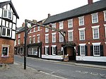 The Green Man and Black's Head Hotel, attached inn sign bridging road