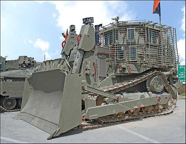 The IDF Caterpillar D9 armored bulldozer is used for a variety of combat engineering tasks, including opening routes, demolishing structures, digging 