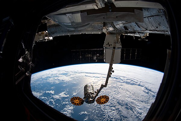 Canadarm2 grapples the S.S. Roger Chaffee, while Dragon C108 is docked to Harmony.