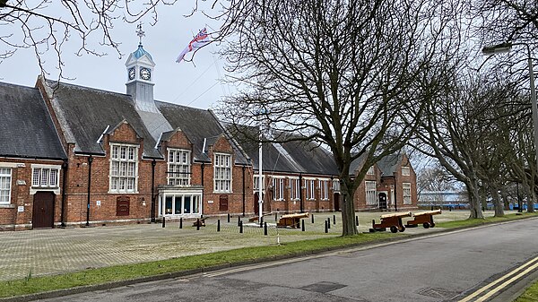 HMS Excellent: the Quarterdeck Block (originally containing a gymnasium, lecture theatre, warrant officers' mess, church rooms and the Church of St Ba