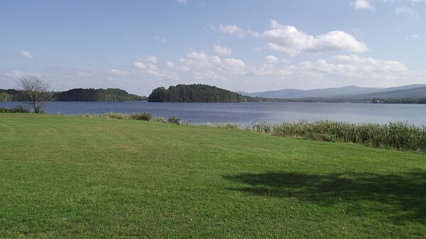 (The) Island (in the) Pond from which the village takes its name