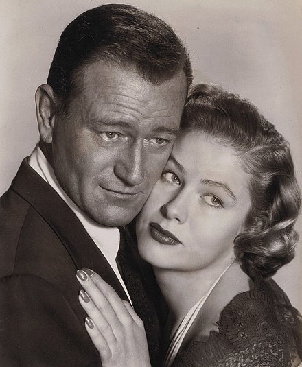 Publicity still of Wayne and Nancy Olson for Big Jim McLain (1952)