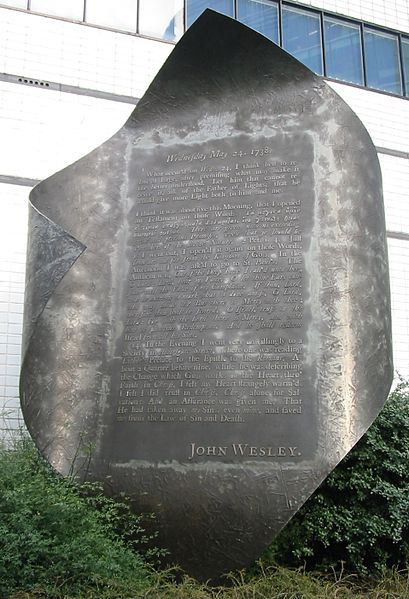 In the Wesleyan Quadrilateral, experience is an additional source of authority. Pictured is a memorial to John Wesley's own experience of the New Birt