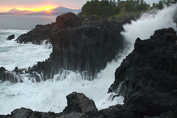 Waves crashing at Jeju Province island