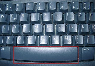 Space bar Key on a typewriter or alphanumeric keyboard in the form of a horizontal bar