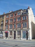 Apartment building in half-open development