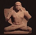 Bodhisattva Maitreya (water bottle on left thigh), Mathura, 2nd century CE.