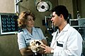 Major (Dr.) John H. Schneider, an Air Force neurosurgeon at Wilford Hall Medical Center, shows Captain Margaret Herring how he reconstructed her shattered skull. Herring was severly - DPLA - 8073706af3e2bd4a91468ca664bd8a21.jpeg