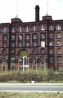 Detail of the central area of this large symmetrical mill during a period of 1980s dereliction Meadow Mill, Stockport - geograph.org.uk - 733201.jpg